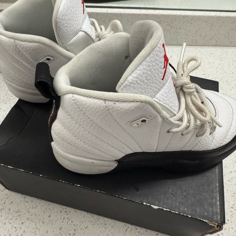 Jordan 12 Retro White and Black Sneakers